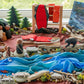Salmon invitation to play learning set with natural materials, wooden figures, river silk, and land-based learning elements for early childhood Indigenous education