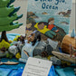 Ocean Invitation to Play learning collection with Indigenous storytelling book, wooden figures, and hands-on materials for land-based learning in early years classrooms