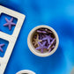 Close-up of wooden sorting tray and starfish counters from Ocean Invitation to Play learning collection for hands-on math and sensory learning in early years classrooms